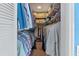 Large walk-in closet with ample shelving and hanging space at 1998 Massachusetts Ne Ave, St Petersburg, FL 33703