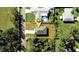 Aerial view of a house, pool, and surrounding lot at 20118 Quesada Ave, Port Charlotte, FL 33952