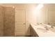 Double vanity bathroom with large mirror and shower at 20118 Quesada Ave, Port Charlotte, FL 33952