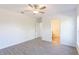 Spacious bedroom with ceiling fan and en-suite bathroom at 20118 Quesada Ave, Port Charlotte, FL 33952