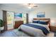 Large bedroom with wood dresser and plush bedding at 20118 Quesada Ave, Port Charlotte, FL 33952