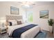 Spacious bedroom with a king-size bed and window at 20118 Quesada Ave, Port Charlotte, FL 33952
