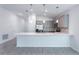 Open concept kitchen with island and stainless steel appliances at 20118 Quesada Ave, Port Charlotte, FL 33952