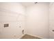 Bright laundry room with shelving and built-in storage at 20118 Quesada Ave, Port Charlotte, FL 33952
