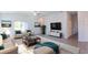 Spacious living room with large TV and comfortable seating at 20118 Quesada Ave, Port Charlotte, FL 33952