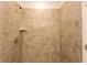 Beige tiled shower with built-in shelf at 20118 Quesada Ave, Port Charlotte, FL 33952