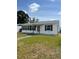 Inviting curb appeal with a well-maintained front yard and charming exterior details at 2800 47Th S St, Gulfport, FL 33711