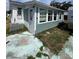 Exterior angle showing the house and the blue paint job on the back sunroom at 2800 47Th S St, Gulfport, FL 33711