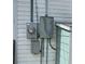 A close-up of exterior electrical boxes and meter showcase the building's utility setup at 2800 47Th S St, Gulfport, FL 33711