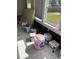 Sunroom view with materials, insulation, and buckets for a home renovation at 2800 47Th S St, Gulfport, FL 33711