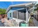 Backyard with screened porch and rain barrel at 3007 56Th S St, Gulfport, FL 33707