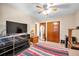 Spacious bedroom with double bed, dresser, and large TV at 3007 56Th S St, Gulfport, FL 33707
