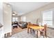 Bright dining area with wooden table and chairs, adjacent to living room at 3007 56Th S St, Gulfport, FL 33707