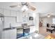 Modern kitchen with stainless steel appliances and white cabinets at 3007 56Th S St, Gulfport, FL 33707