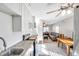 Bright kitchen features granite countertops and white cabinets at 3007 56Th S St, Gulfport, FL 33707