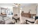 Open living room and kitchen area with brown leather couch at 3007 56Th S St, Gulfport, FL 33707