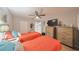 Comfortable bedroom with two twin beds and ample closet space at 302 Canton Ct # 56, Sun City Center, FL 33573
