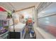 Convenient laundry room with washer, dryer, and storage at 302 Canton Ct # 56, Sun City Center, FL 33573