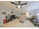Living room with comfortable seating and large flat screen TV at 302 Canton Ct # 56, Sun City Center, FL 33573