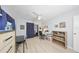 Bright home office with desk, chair, and access to patio at 302 Canton Ct # 56, Sun City Center, FL 33573