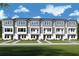 Modern townhouses with gray siding and white trim at 3109 4Th N Ter, St Petersburg, FL 33713