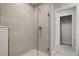 Bathroom with a walk-in shower and closet at 5655 Brooklet Woods Dr, Wesley Chapel, FL 33545