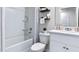 Clean bathroom with a shower/tub combo, white vanity, and neutral decor at 6316 Sophie Oaks Ct, Tampa, FL 33610