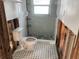 Bathroom with new shower and toilet under renovation at 909 Mandalay Ave, Clearwater Beach, FL 33767