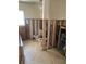 Bathroom featuring a standard toilet and neutral tile flooring at 909 Mandalay Ave, Clearwater Beach, FL 33767