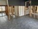 Renovation in progress, showcasing tiled floors and exposed framing at 909 Mandalay Ave, Clearwater Beach, FL 33767