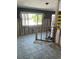 Large living room featuring tiled floors and a bright window offering a view at 909 Mandalay Ave, Clearwater Beach, FL 33767