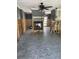 Large living area featuring a centrally located fireplace and tiled flooring at 909 Mandalay Ave, Clearwater Beach, FL 33767
