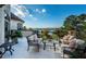 Balcony with outdoor seating area and great view of the water at 118 Harbor View Ln, Belleair Bluffs, FL 33770