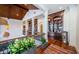 Second floor hallway with built-in bookshelves and wood ceiling detail at 118 Harbor View Ln, Belleair Bluffs, FL 33770