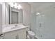 Bathroom with walk-in shower and white vanity at 14825 Paddock Pond Ave, Lithia, FL 33547