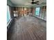 Living room undergoing renovation with wood-look tile at 16018 Redington Dr, Redington Beach, FL 33708