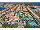 Community overview featuring pool, tennis, pickleball courts at 16847 Whisper Elm St, Wimauma, FL 33598