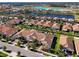 Aerial view of community and Crystal Lagoon at 16847 Whisper Elm St, Wimauma, FL 33598