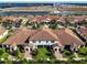 Community view of townhomes and landscaping at 16847 Whisper Elm St, Wimauma, FL 33598