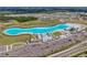 Aerial view of resort-style Crystal Lagoon at 16847 Whisper Elm St, Wimauma, FL 33598