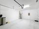 Spacious garage with ample storage space at 16847 Whisper Elm St, Wimauma, FL 33598