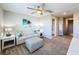 Spacious loft area with sofa and plenty of room for relaxation at 16847 Whisper Elm St, Wimauma, FL 33598
