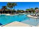 Resort-style pool with plenty of lounge chairs and a relaxing atmosphere at 16847 Whisper Elm St, Wimauma, FL 33598