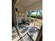 Screened porch with backyard view and relaxing seating at 1860 Massachusetts Ne Ave # 124, St Petersburg, FL 33703