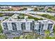 Modern condo building with balconies, parking, and surrounding city views at 201 W Laurel St # 308, Tampa, FL 33602