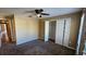 Spacious bedroom with neutral walls and carpet at 37670 Aaralyn Rd, Zephyrhills, FL 33542