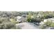 Aerial view of community featuring multiple buildings at 37715 Aaralyn Rd, Zephyrhills, FL 33542