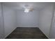 Small bedroom with ceiling fan and wood-look floors at 37715 Aaralyn Rd, Zephyrhills, FL 33542
