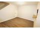 Spacious dining room featuring wood-look floors and neutral wall colors at 37715 Aaralyn Rd, Zephyrhills, FL 33542