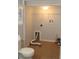 Small laundry room with tile flooring and a stacked washer/dryer hookup at 37715 Aaralyn Rd, Zephyrhills, FL 33542
